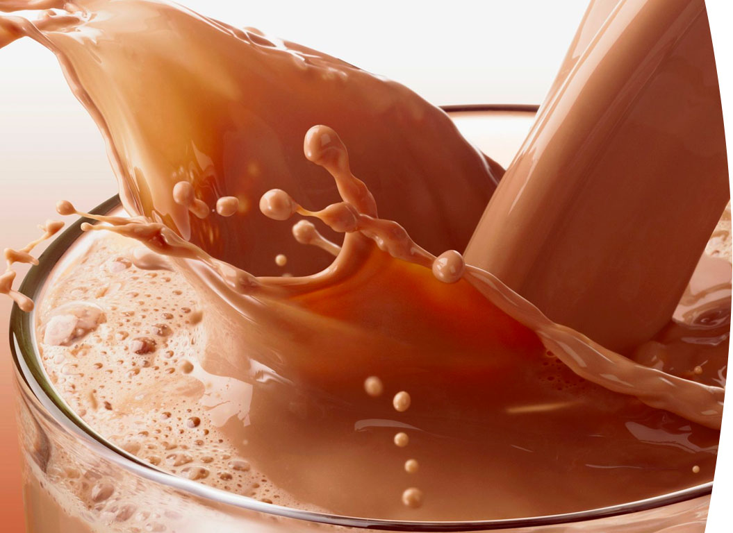 Chocolate milk pouring into glass